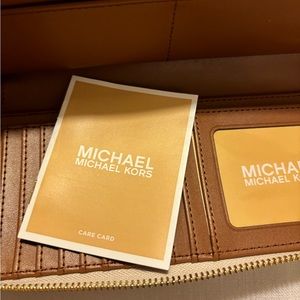 Cream colored Michael Kors wallet, brand new